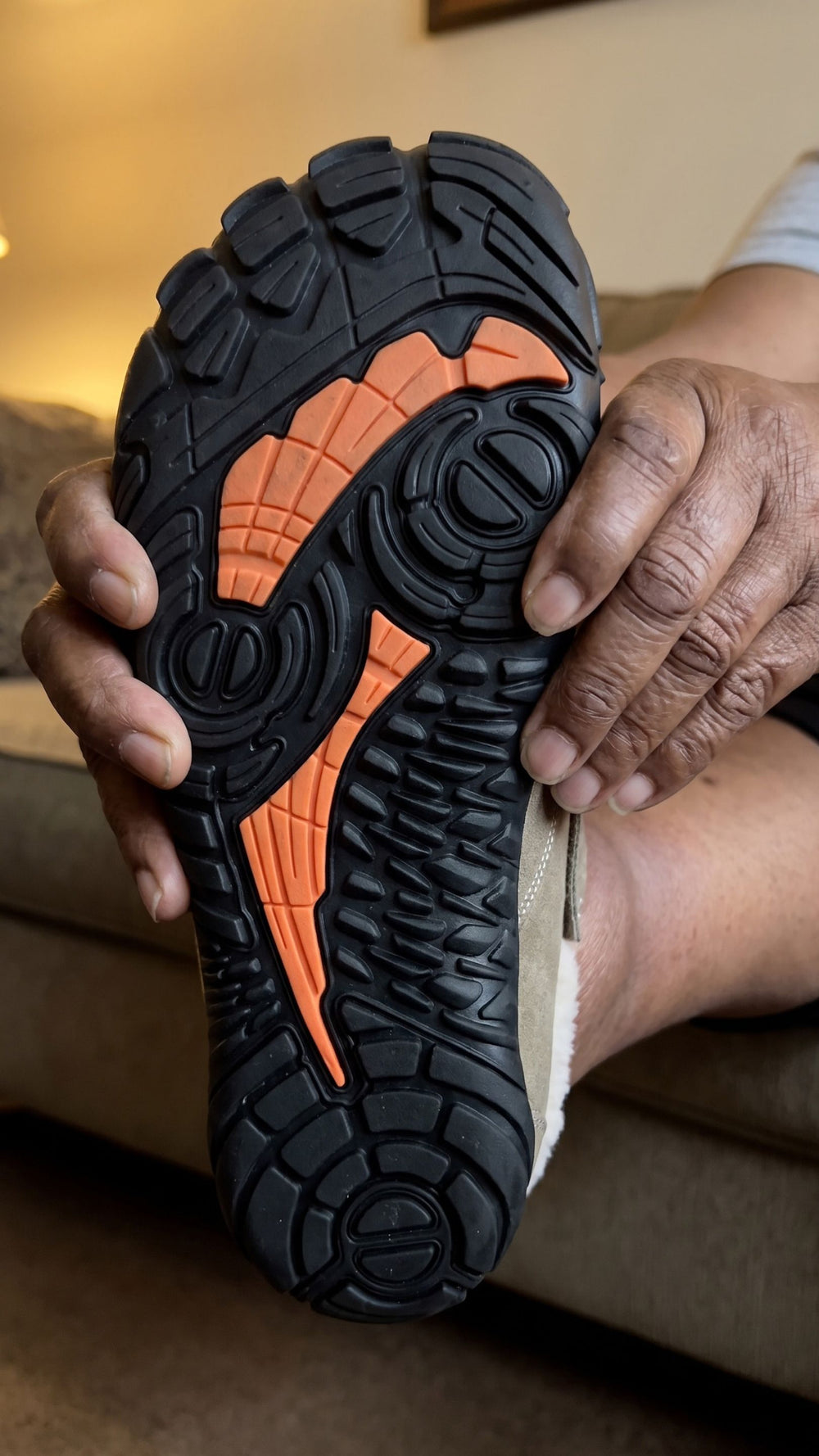 Close-up of the CozyGrip deep-tread non-slip rubber outsole